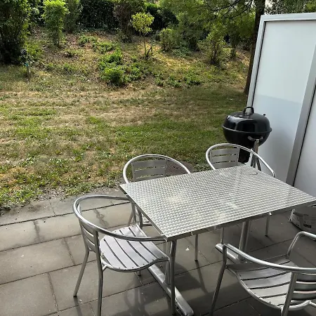 Garden With Sunny Terrace In